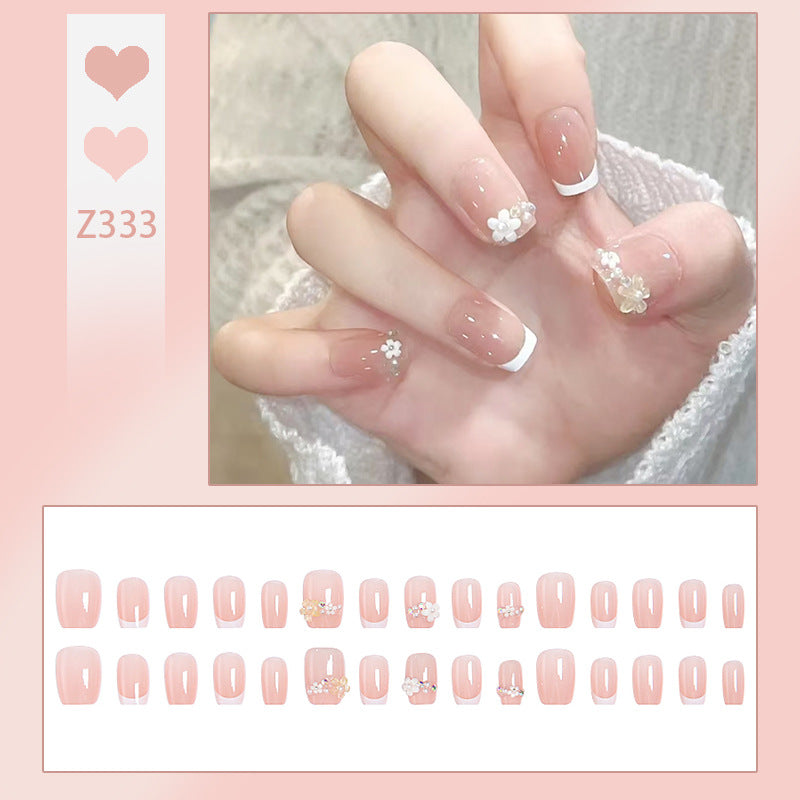 Nail set with elegant flower appliqués and exquisite glitter embellishments Bowlift