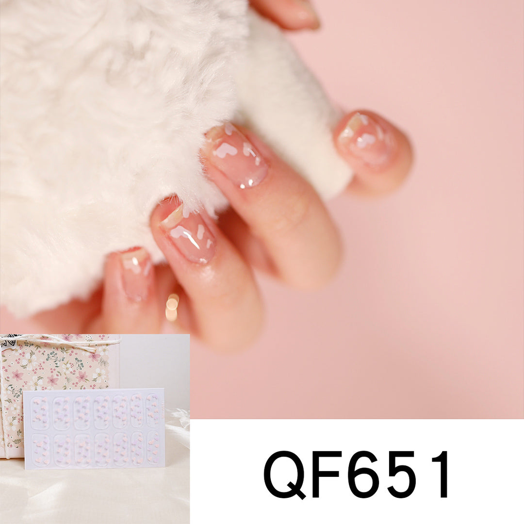 Artificial nail art with heart-shaped designs and soft color gradients Bowlift
