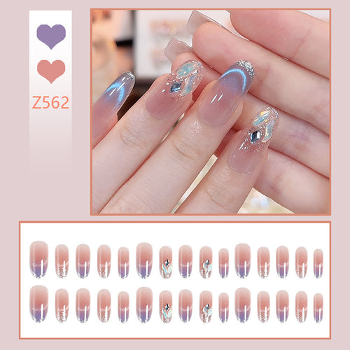 Acrylic nail set with elegant glitter effect and beautified embellishments Bowlift
