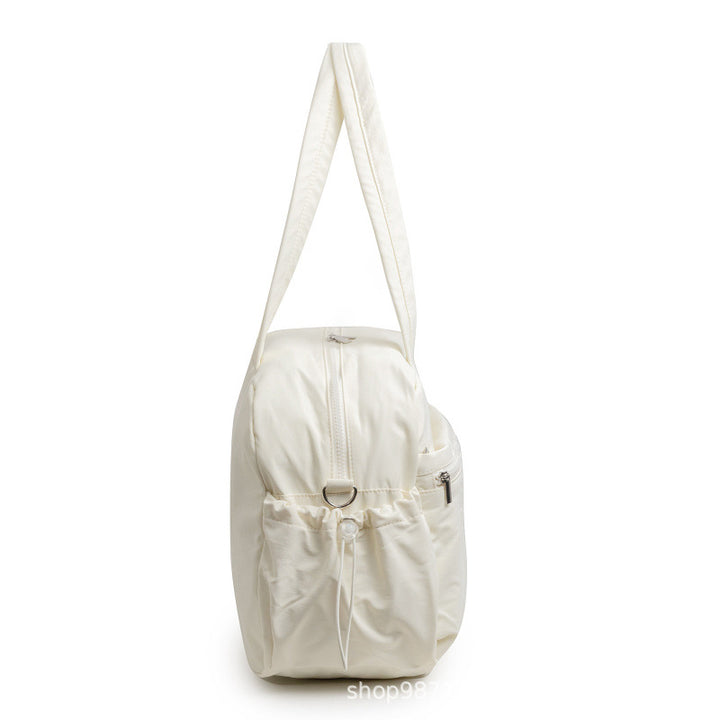 Padded travel bag with practical outer pockets Bowlift