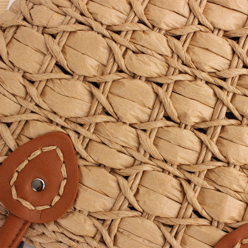 Handcrafted wicker bag with elegant leather accents Bowlift