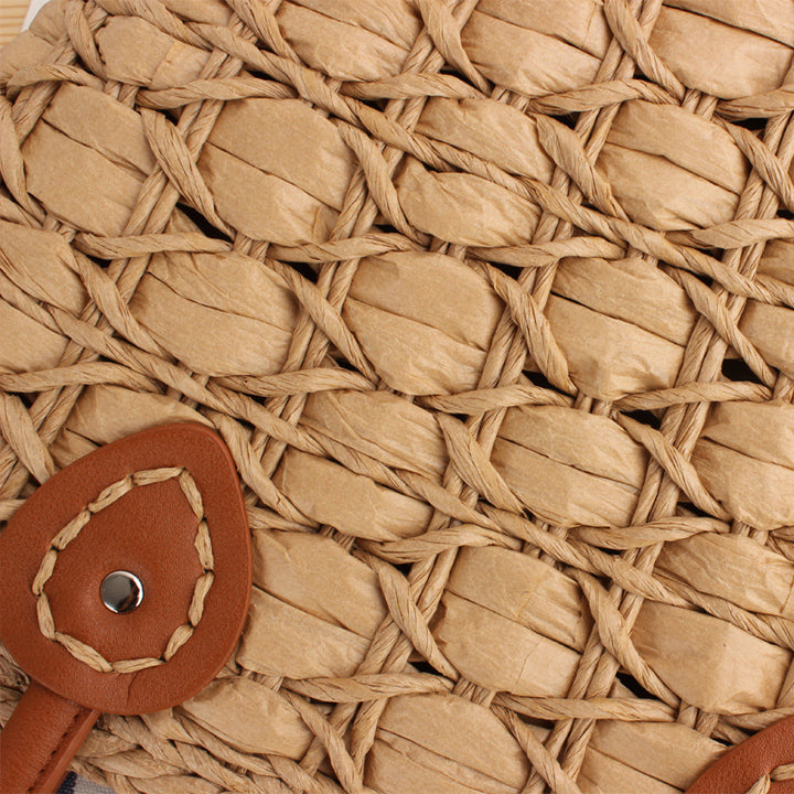 Handcrafted wicker bag with elegant leather accents Bowlift