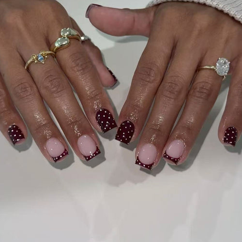 Artful nail art with elegant polka dot design Bowlift