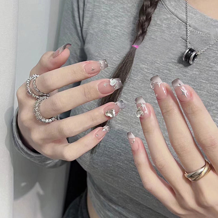 Acrylic nail set with sparkling crystal decorations Bowlift