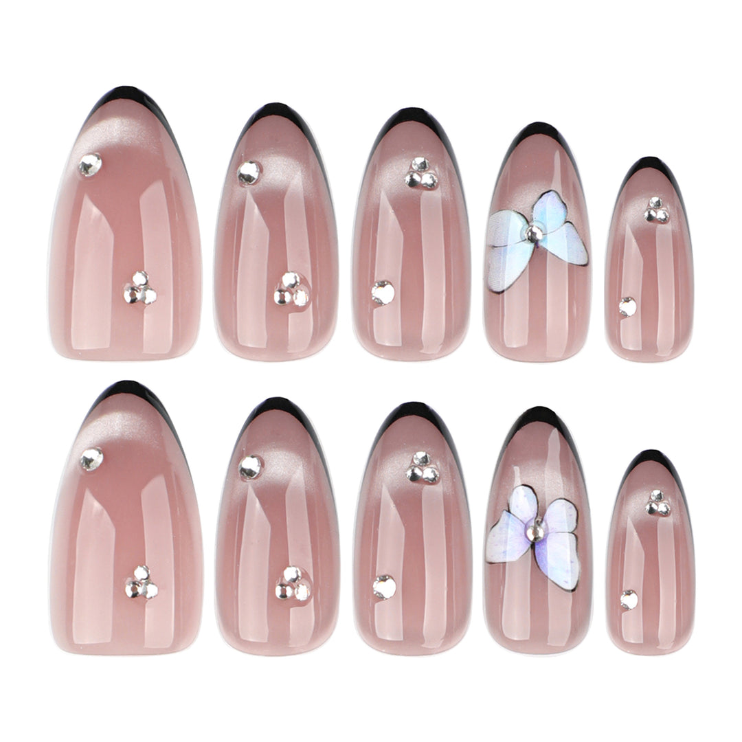 Artificial nail art with pearl and flower decorations Bowlift