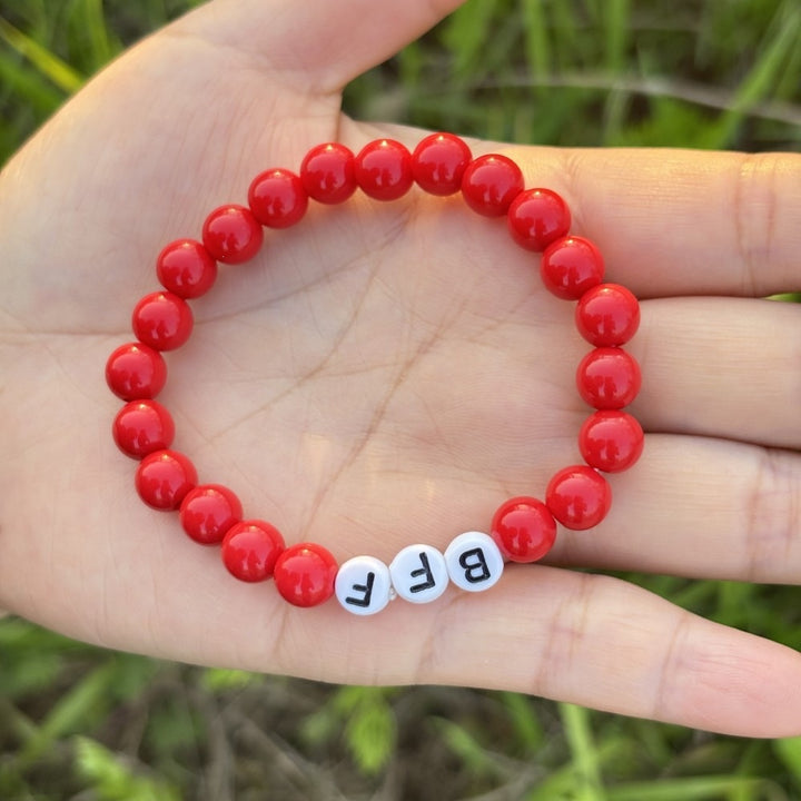 Friendship bracelet made of pastel beads Bowlift
