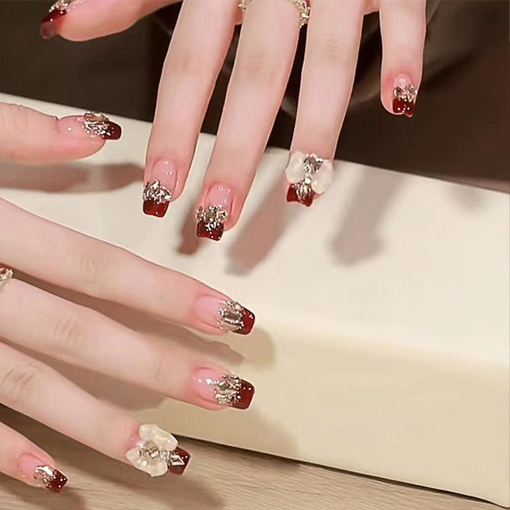 Artificial nails with glamorous floral decorations Bowlift