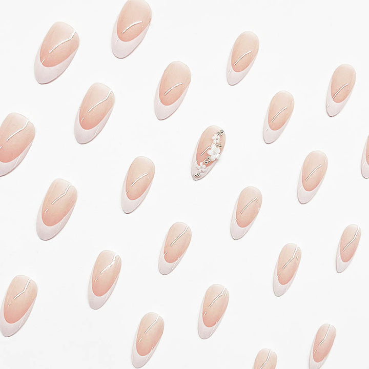 Acrylic Nail Set with Filigree Flower Decorations and Elegant French Design Bowlift
