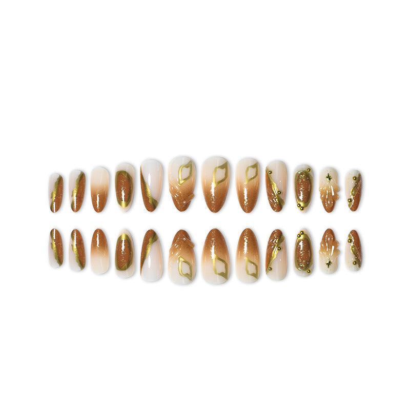 Luxurious Press-On Nail Set with Ornate Gold Detailing Bowlift