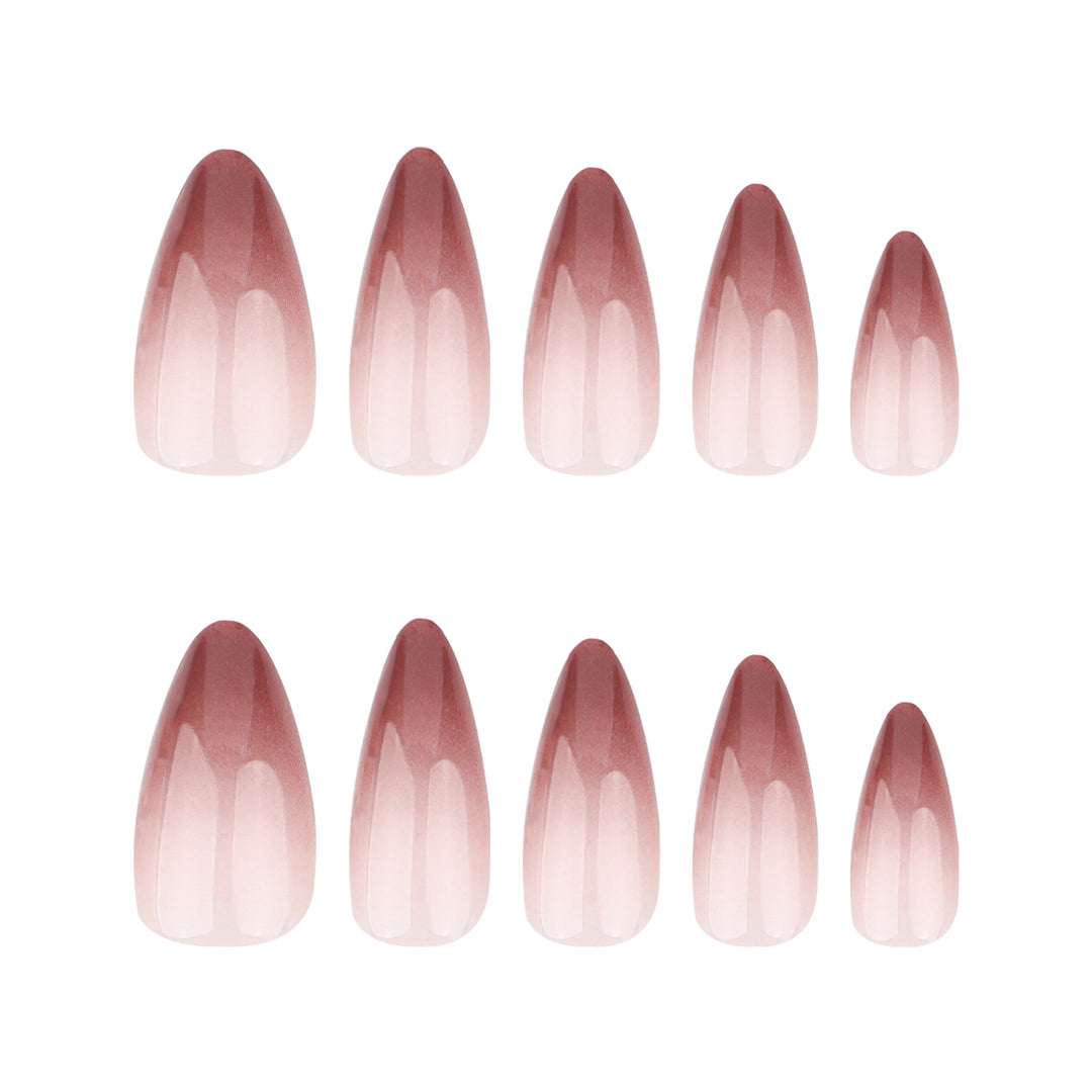 Artistic stiletto nails with elegant ombre design Bowlift