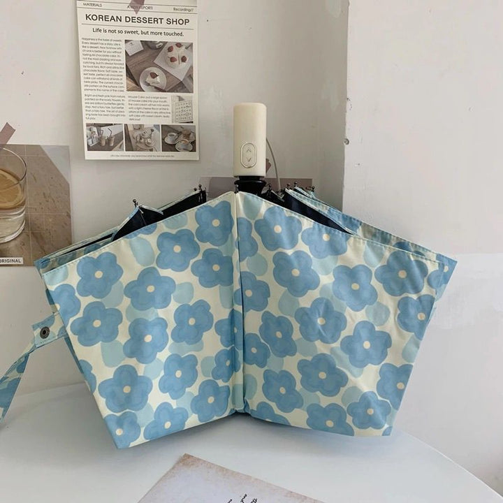 Women Folding Umbrella with Floral Pattern Bowlift