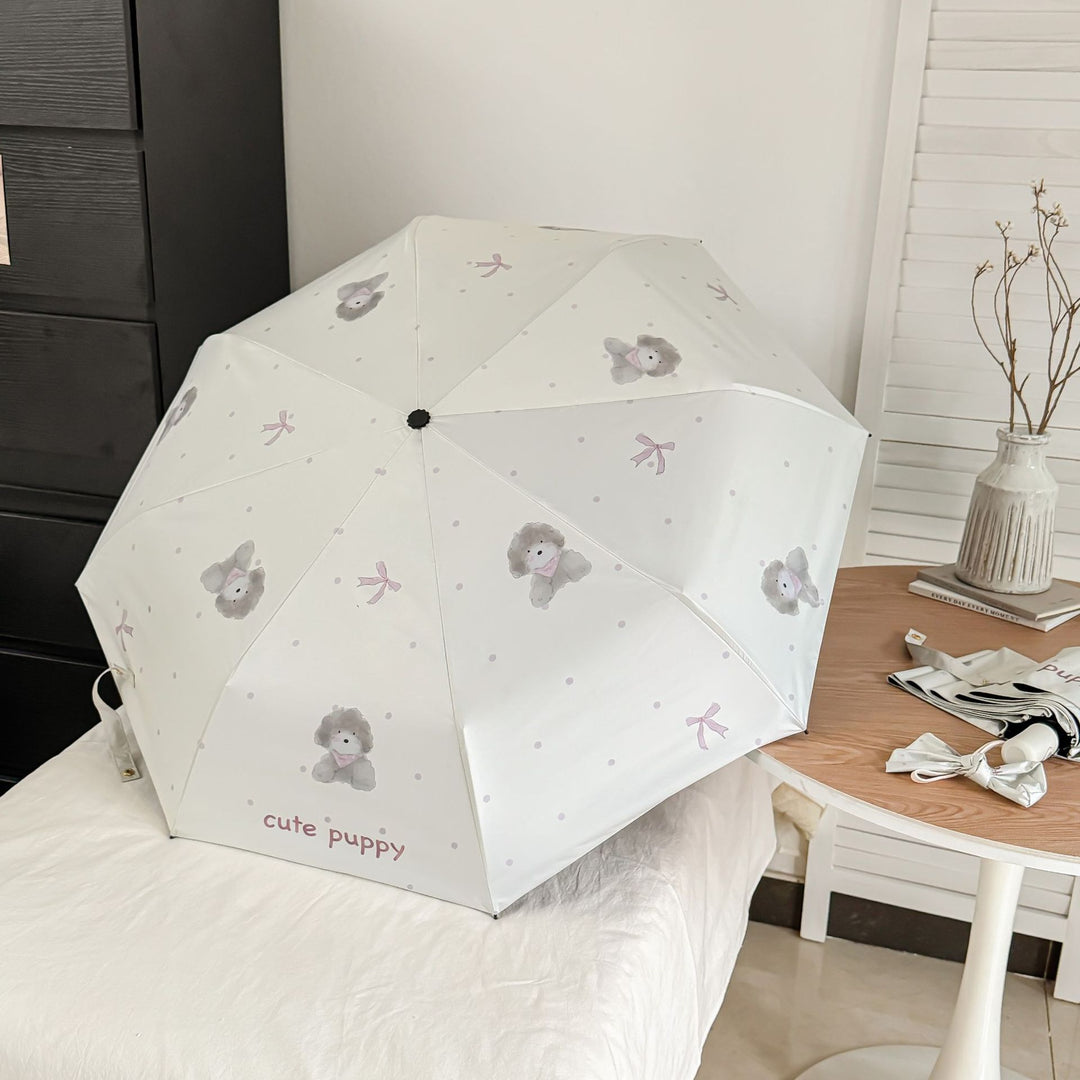 Ladies folding umbrella with playful animal design Bowlift