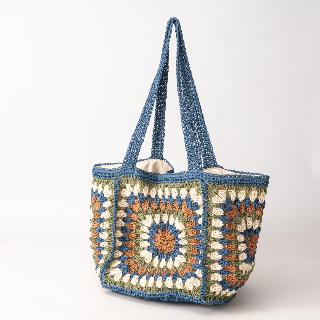 Beach bag made of hand-woven natural material with a square pattern Bowlift
