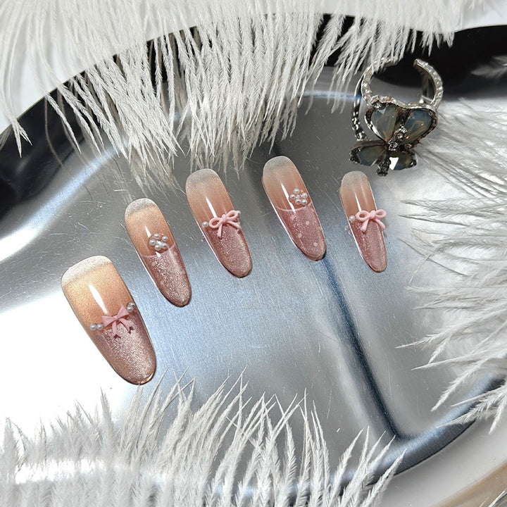 Elegant artificial nails with bows and pearl decoration Bowlift