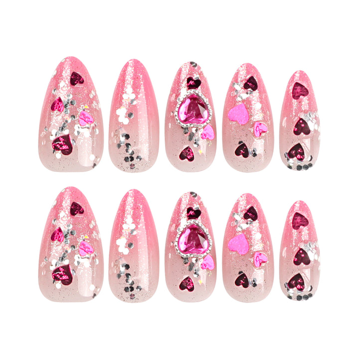 Artful nail art with playful heart designs and glitter Bowlift