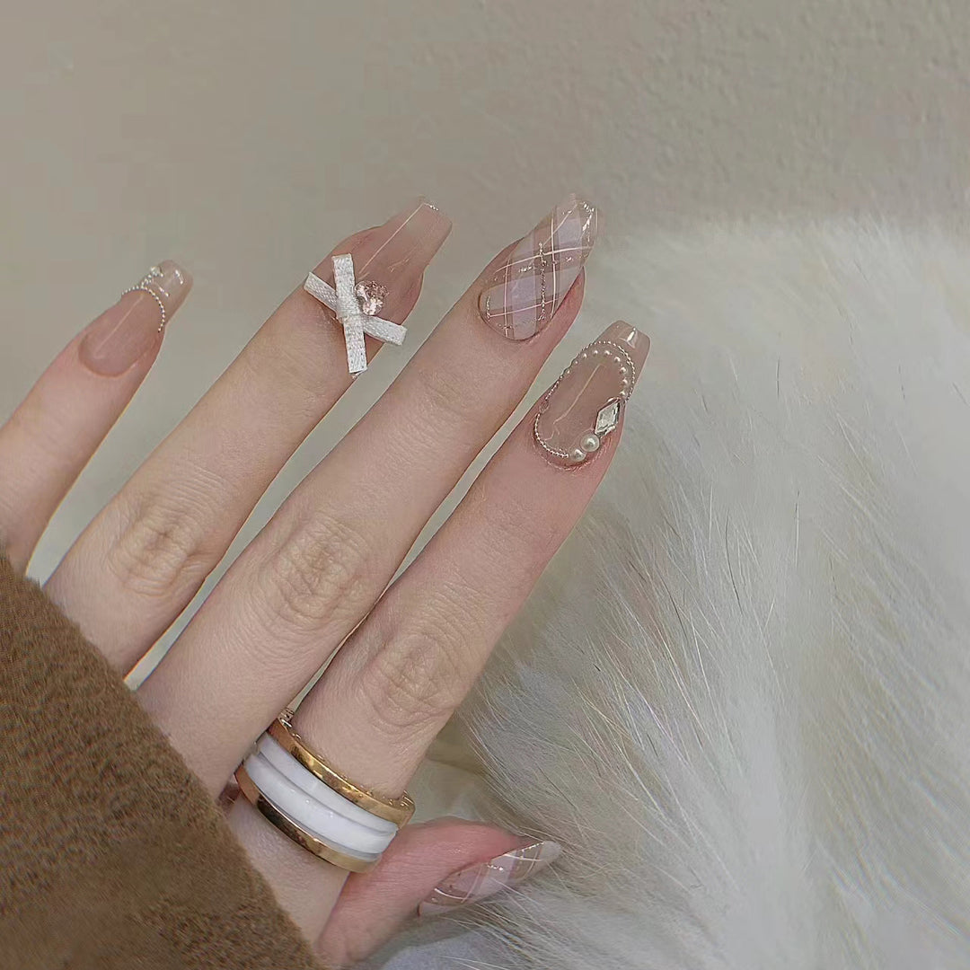 Elegant Press-On Nail Art Set with Ribbons and Gemstone Accents Bowlift