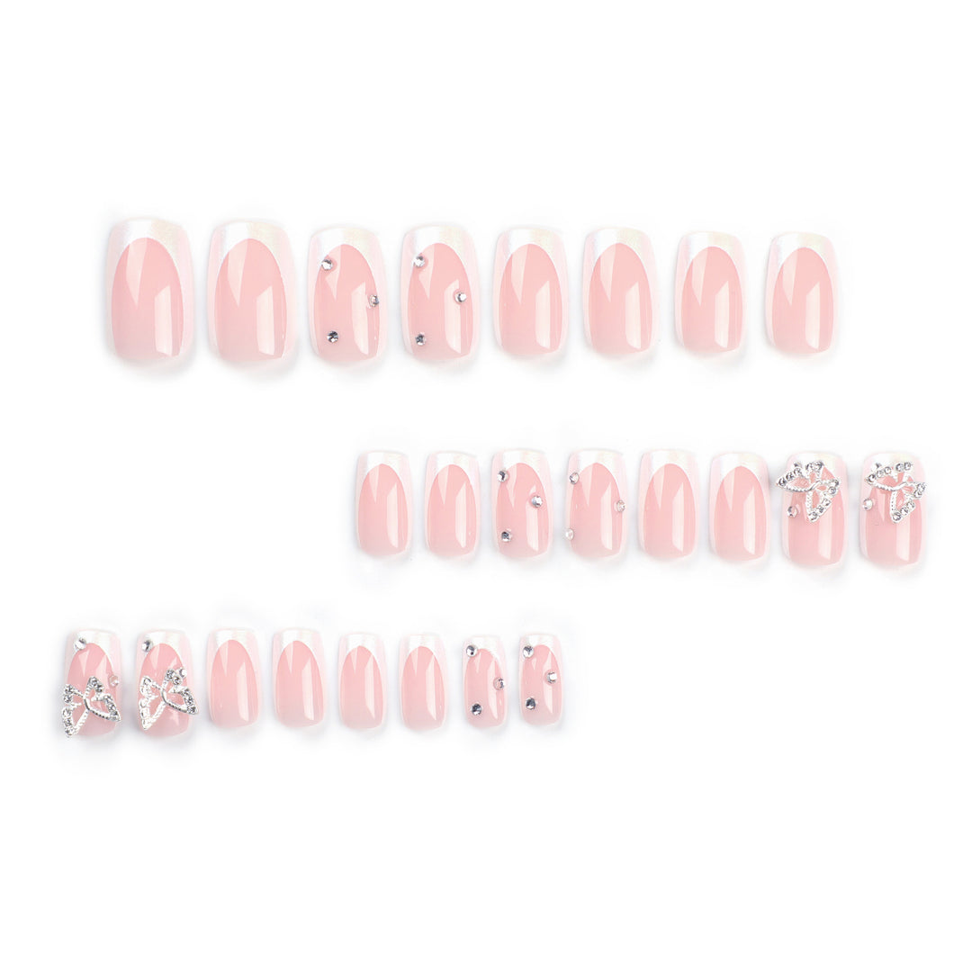 Elegant Nail Art with Glitter and Floral Accents Bowlift