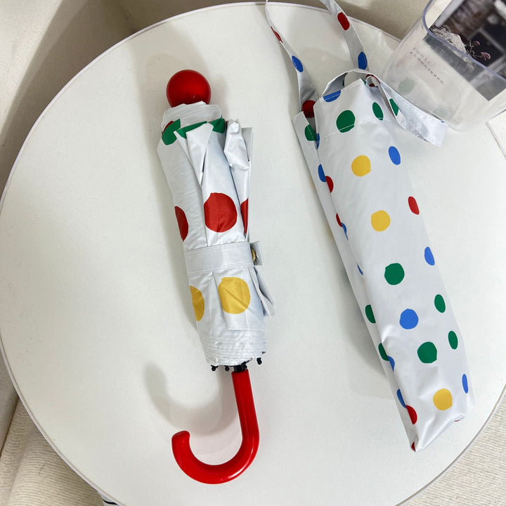 Ladies designer foldable umbrella with colorful polka dot pattern Bowlift