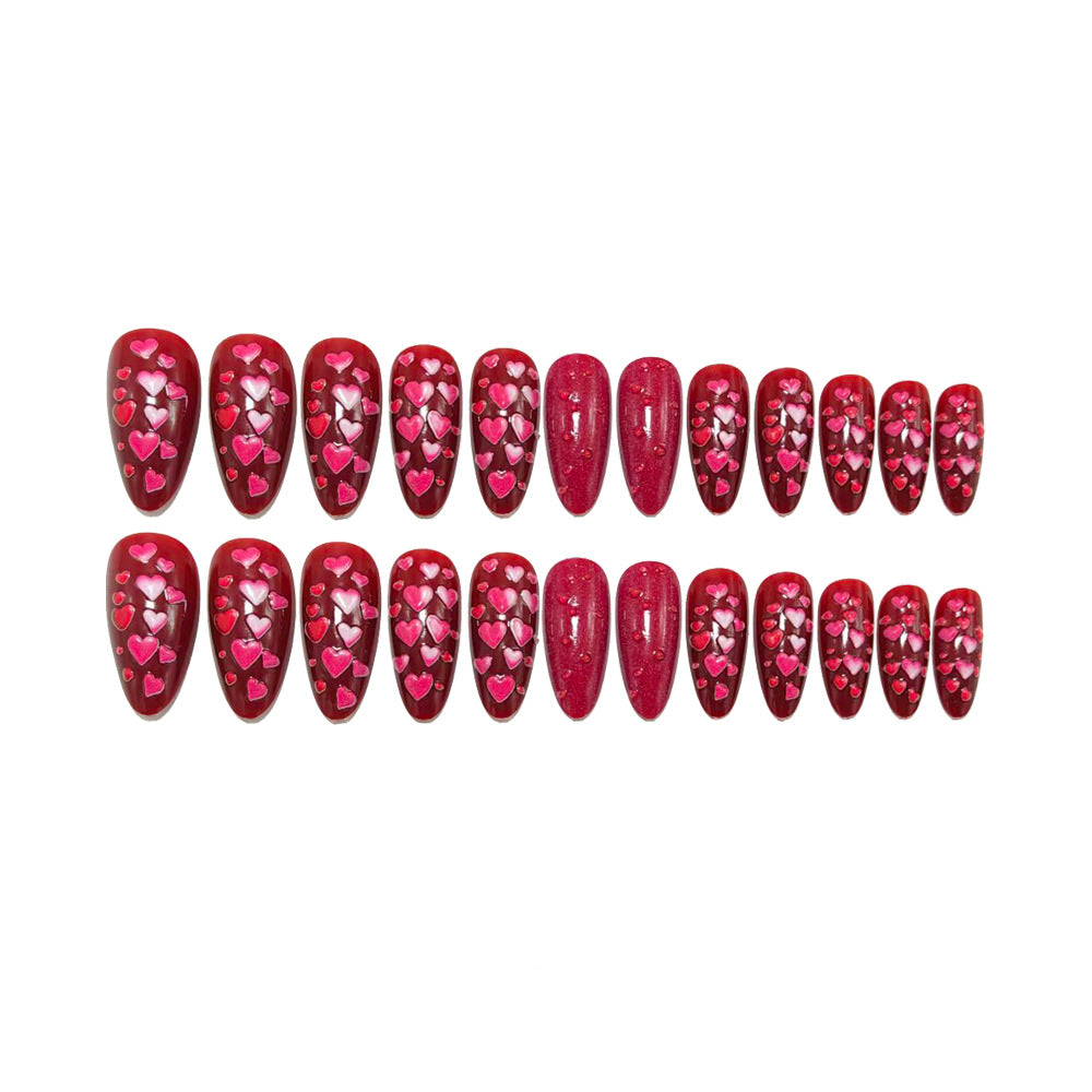Artificial nails with heart motif and glitter effects Bowlift