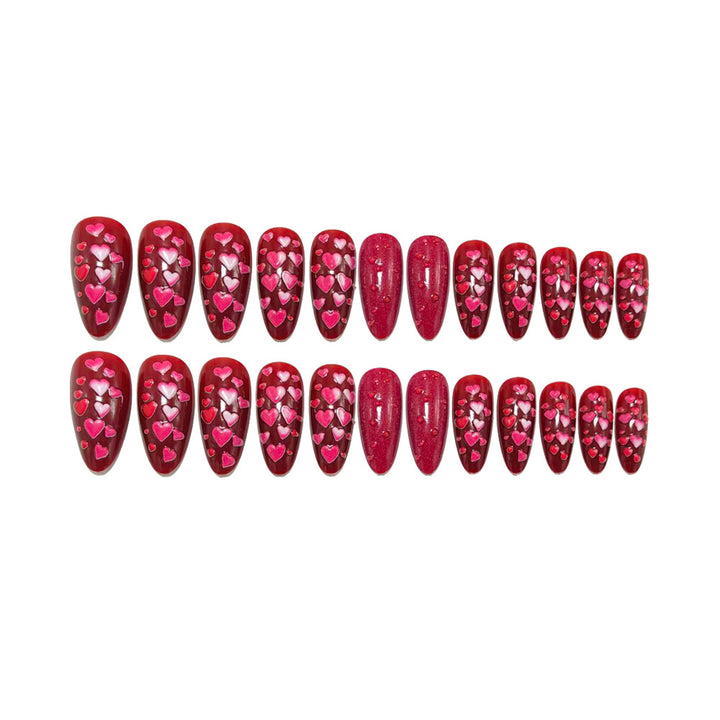 Artificial nails with heart motif and glitter effects Bowlift