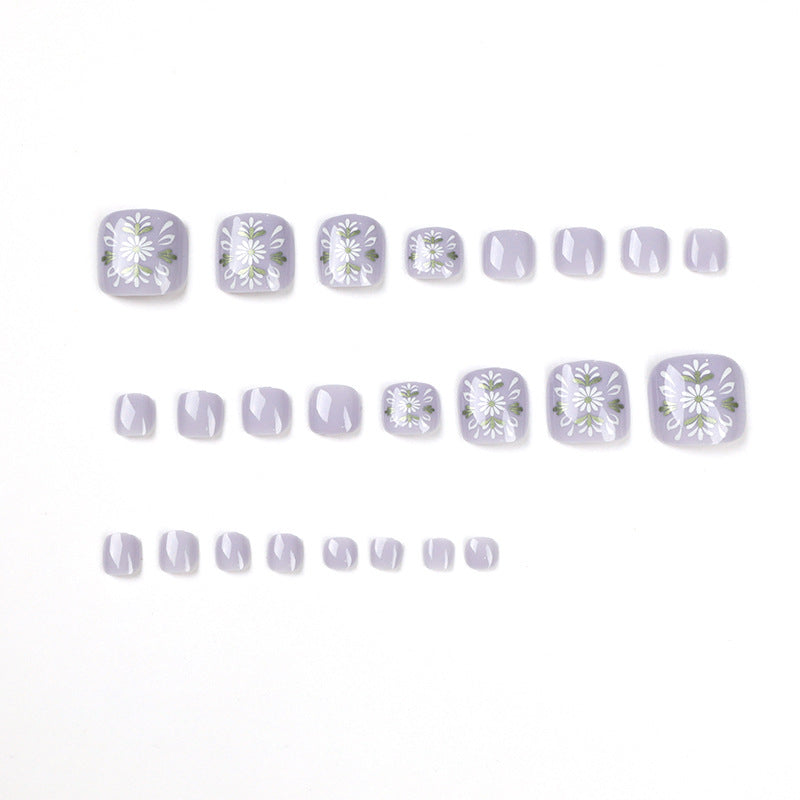 Artistic toenail design with elegant floral design Bowlift