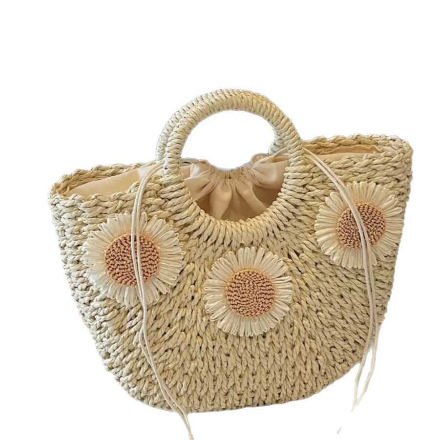 Handbag made of natural material with floral accents Bowlift