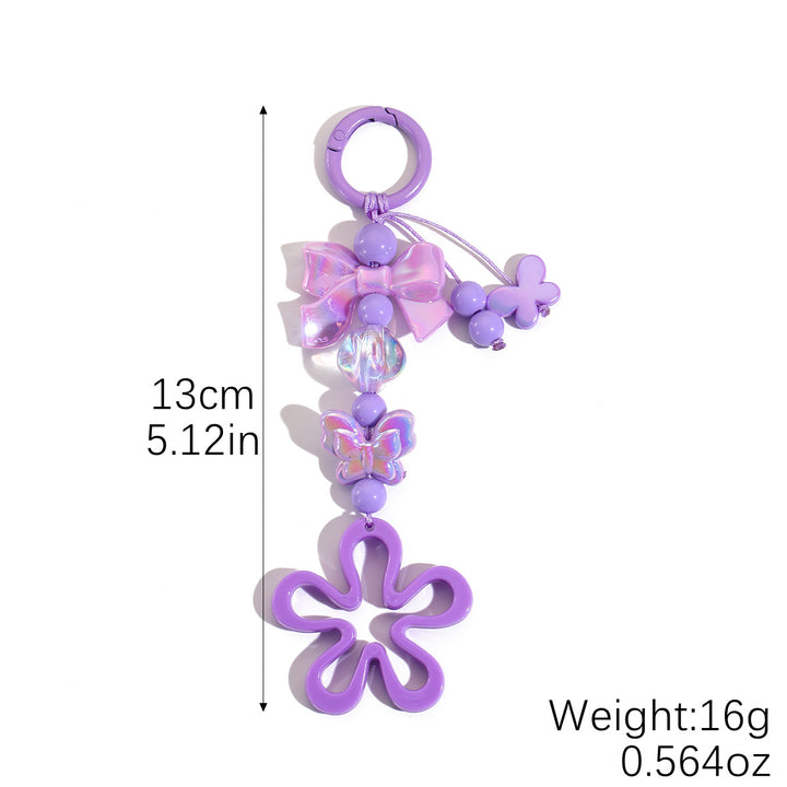 Playful keychain with flower and butterfly details Bowlift