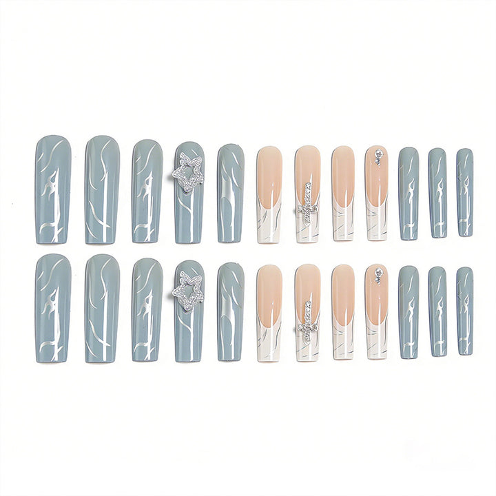 Artificial nails with luxurious marble design and radiant embellishments Bowlift