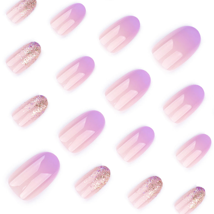 Artful nail art with ombre design and glitter accents Bowlift
