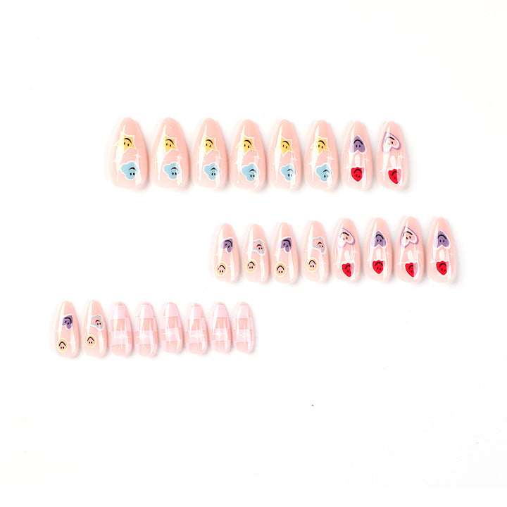Creative nail art with playful emoji motifs Bowlift