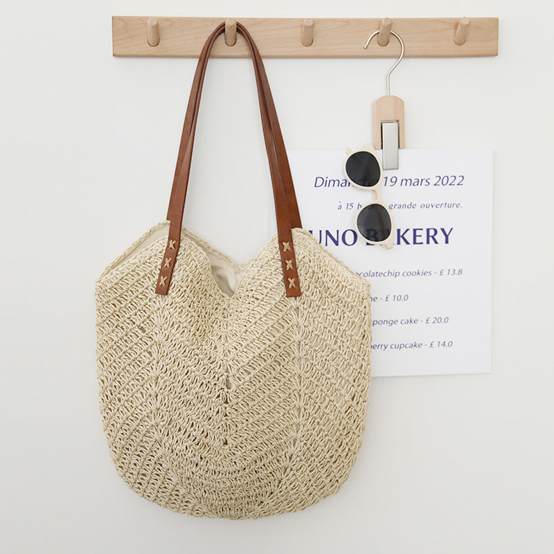 Braided basket bag with sturdy leather handles Bowlift