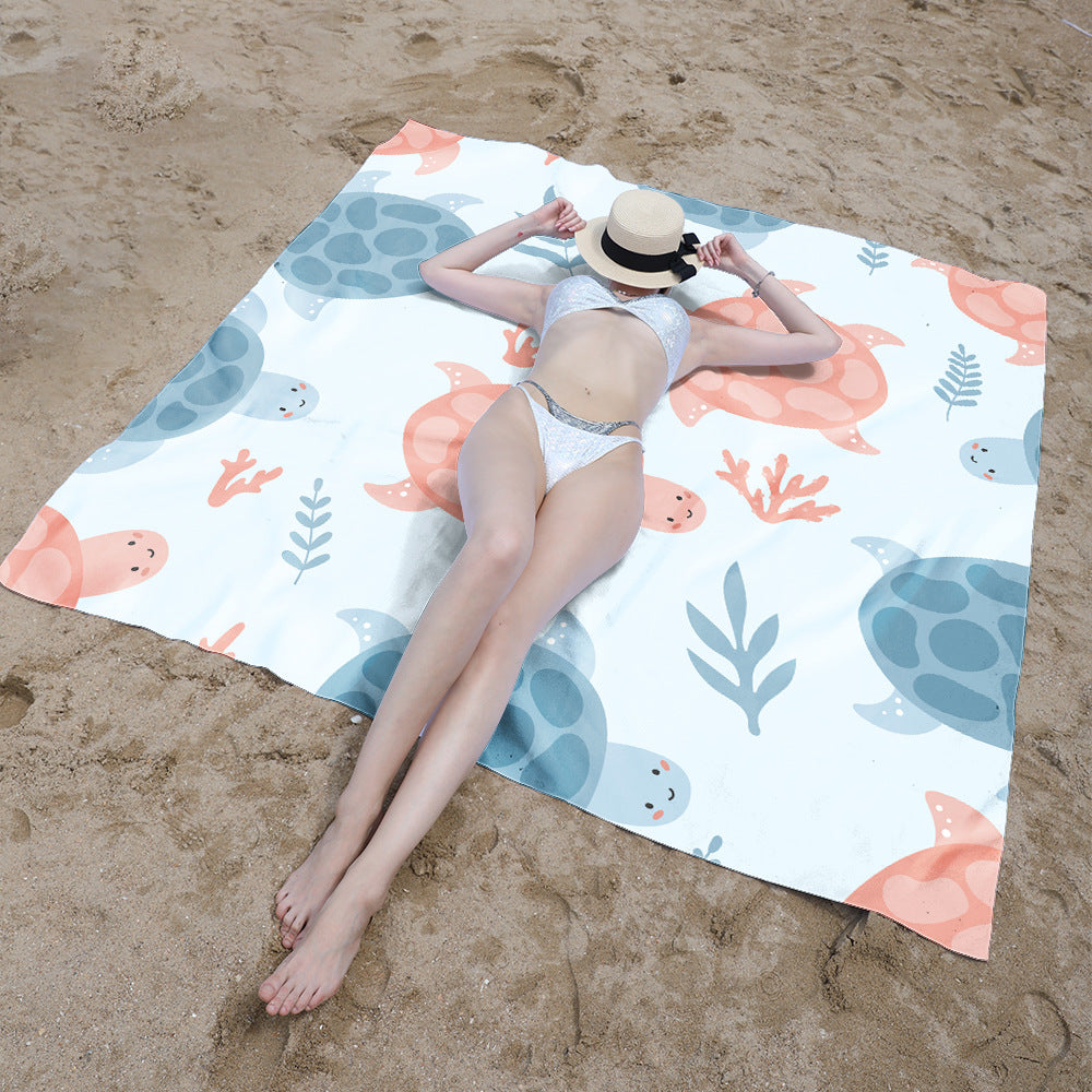 Beach blanket with colorful turtle pattern Bowlift