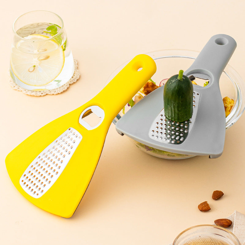 Multifunctional kitchen grater with integrated bottle opener function Bowlift
