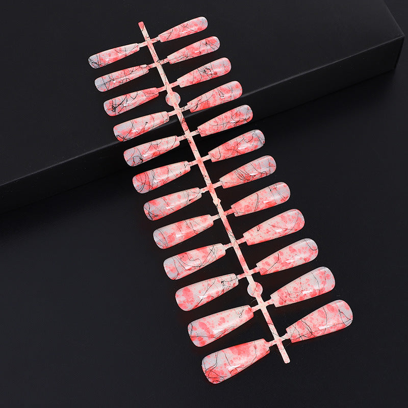 Creative nail art with blood splatter design Bowlift