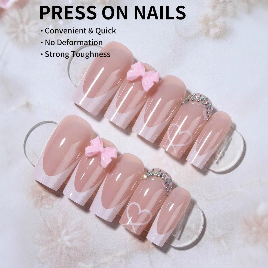 Artificial nail set with elegant bow and glitter decorations Bowlift