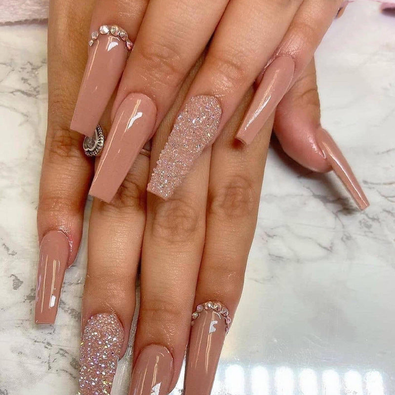 Glamorous artificial nail extensions with rhinestone and glitter details Bowlift