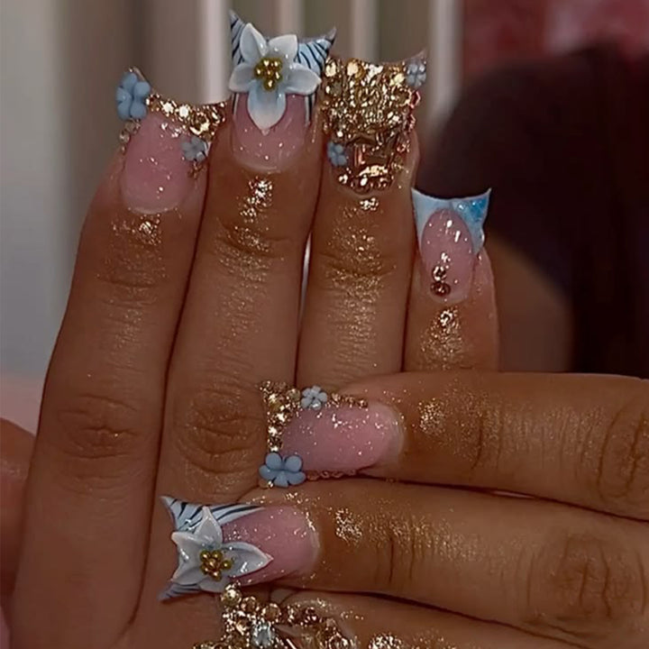 Artful Nail Extensions with Floral Design and Glitter Bowlift
