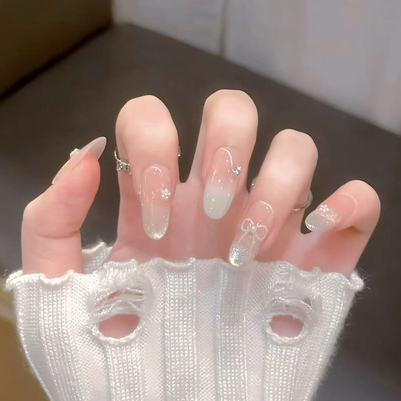 Decorative Press-On Nail Art with Bow and Gem Accents Bowlift