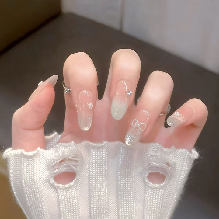 Decorative Press-On Nail Art with Bow and Gem Accents Bowlift