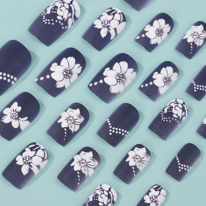 Artificial nails with elegant floral designs Bowlift