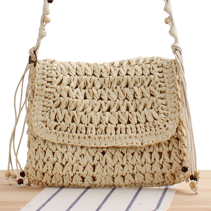 Braided Natural Material Handbag with Playful Fringes Bowlift