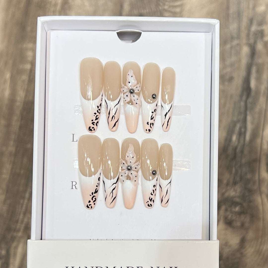 Artistic Stiletto Nail Art Set with Elegant Decorative Elements Bowlift