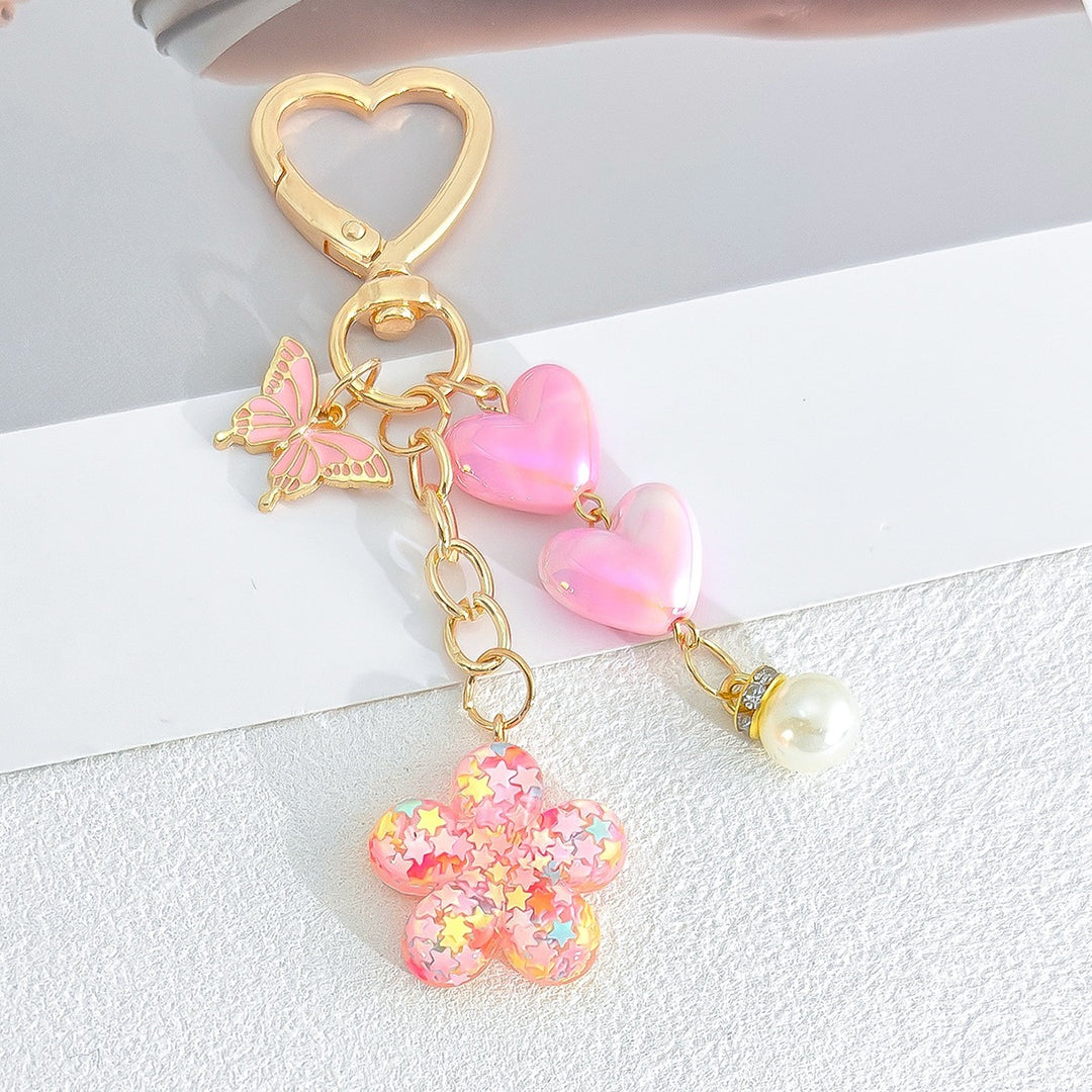 Playful keychain with hearts and flower motif Bowlift