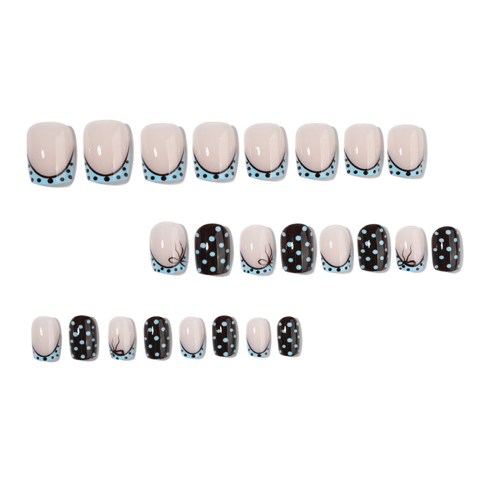 Artful nail extensions with playful dots and elegant design Bowlift