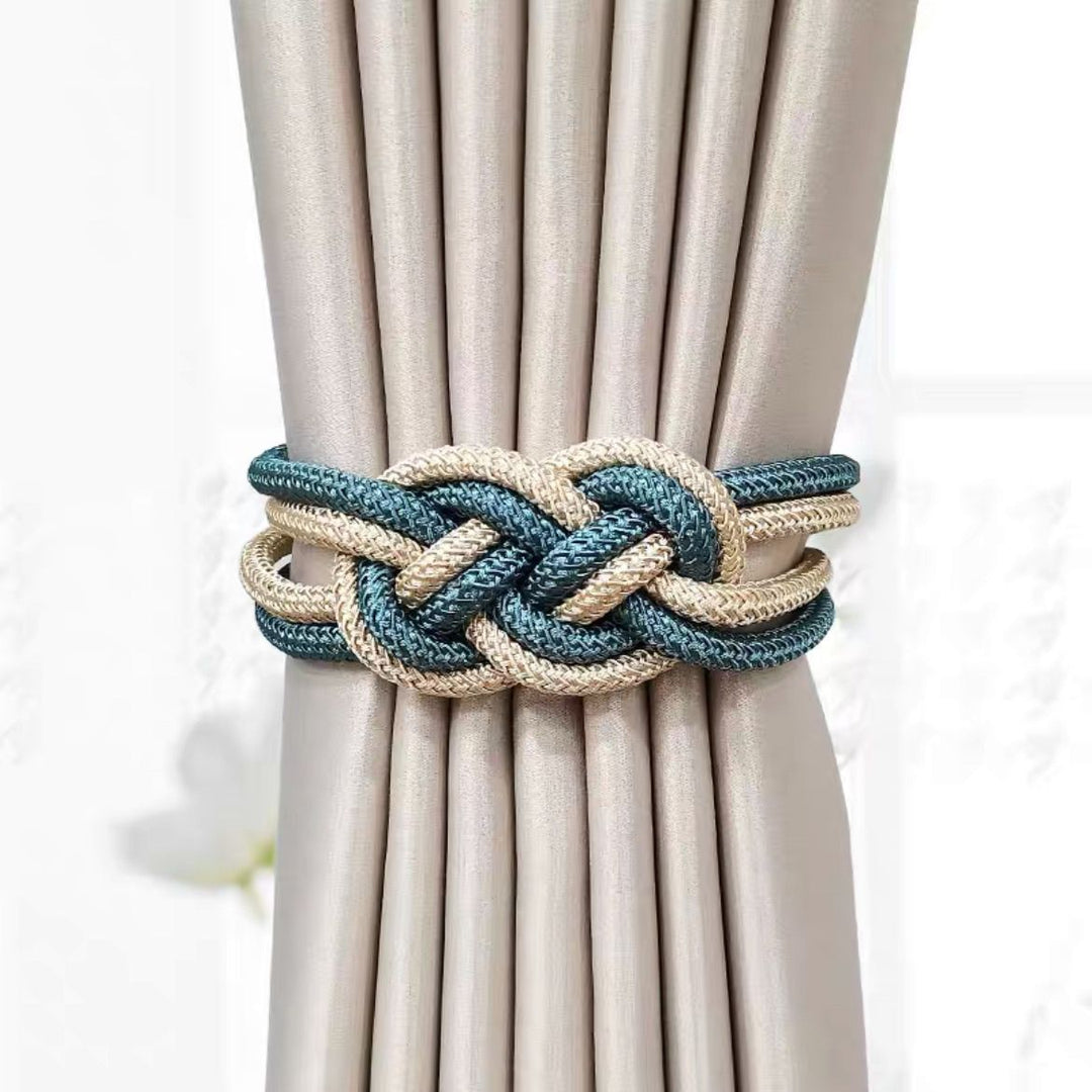 Decorative curtain tieback with braided design Bowlift