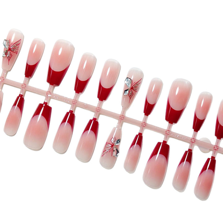 Artificial nails with elegant floral design and glitter accents Bowlift