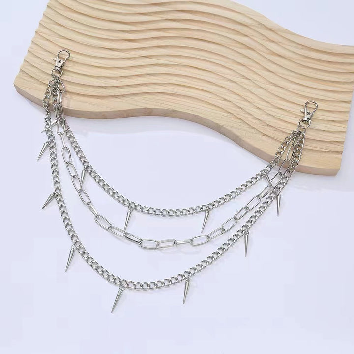 Fashionable chain belt with spiked details Bowlift