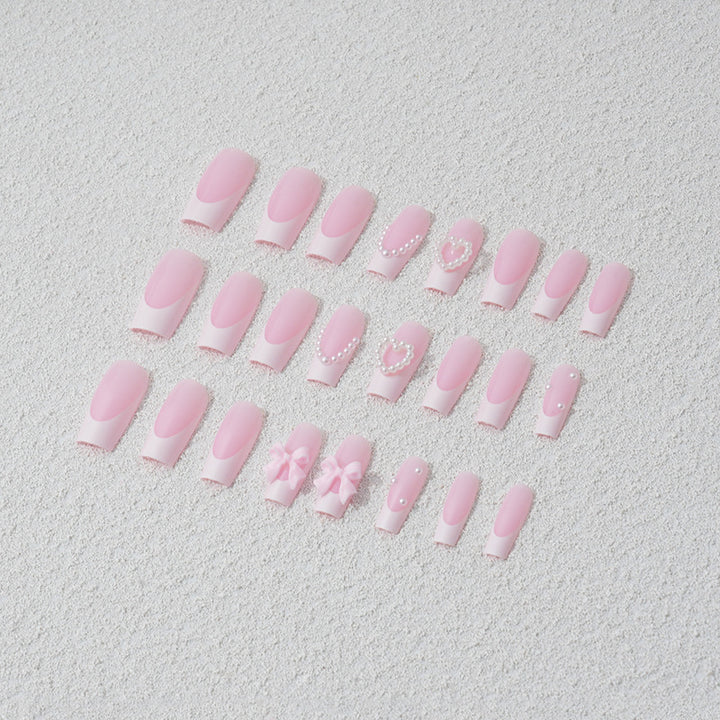 Artificial nail set with 3D bows and pearl accents Bowlift