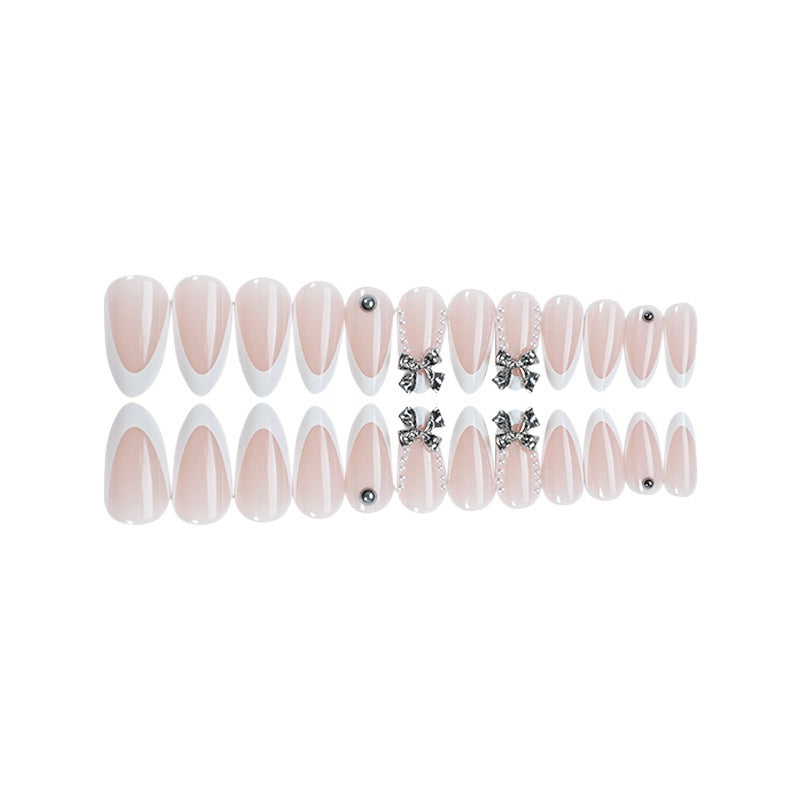 Acrylic nail set with elegant decorative embellishments Bowlift