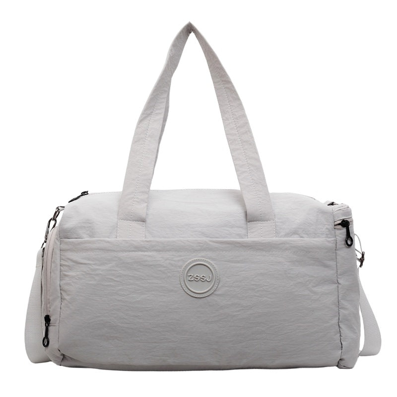 Sporty travel bag with practical exterior pockets Bowlift